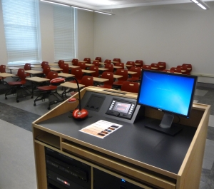 Classroom 301 empty, individual desk chairs