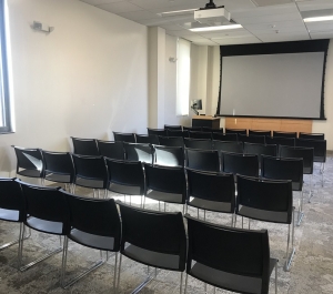 Zemsky Presentation Room, rows of chairs facing projection screen